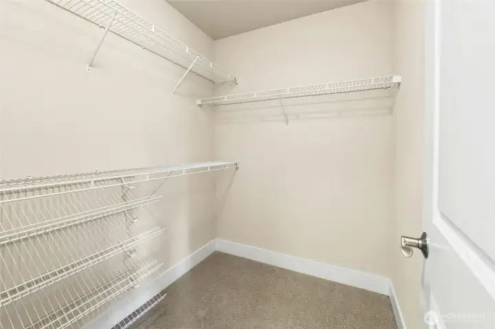 Primary walk-in closet.