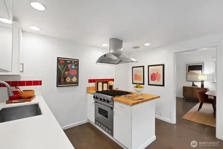 Viking Range and deep farm sink enhance the function of this kitchen.