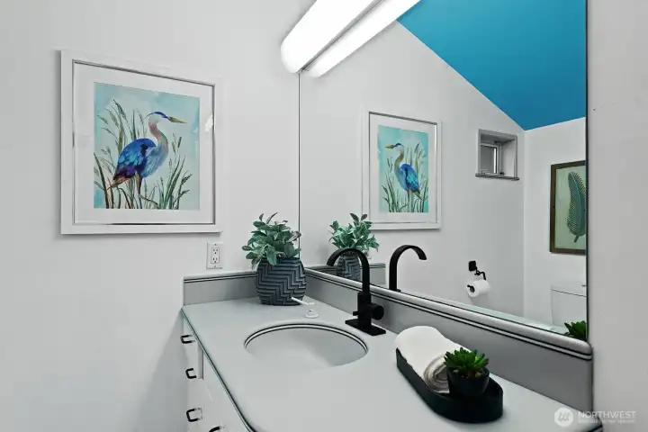 Full bath serves the 3 bedrooms on this floor.
