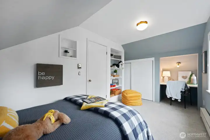 Big closet, built in desk and shelves, new carpet, a really sweet room.