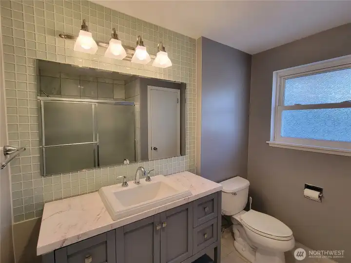 Upper level main shared bathroom.