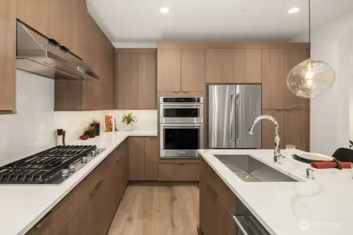 Gourmet Kitchen on 2nd Floor : KitchenAid appliances includes Gas cooktop, fridge.  Washer and Dryer are also included.