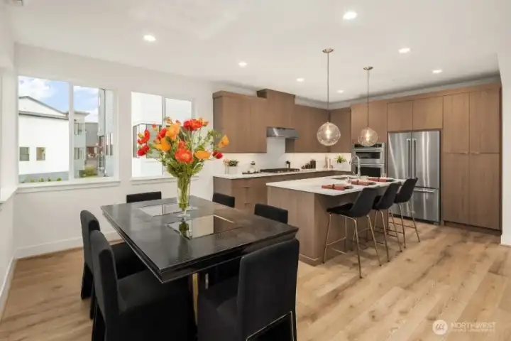 Gourmet Kitchen on 2nd Floor : KitchenAid appliances includes Gas cooktop, fridge. Washer and Dryer are also included.