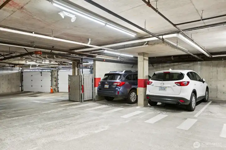 These are the 2 parking stalls 33/34 very close to the Garage doors.