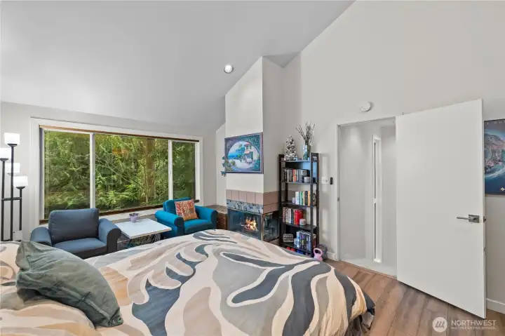 Private Primary Suite w/seating area & fireplace