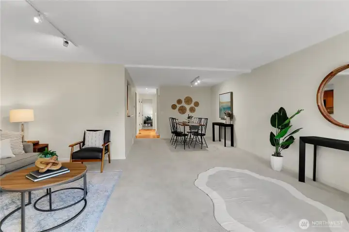 Spacious dining room and family room, with new carpet and paint thoughout!