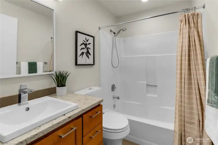Full hall bathroom on upper level