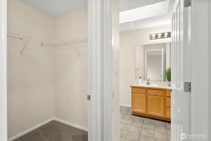Primary bath with walk in closet on the left.