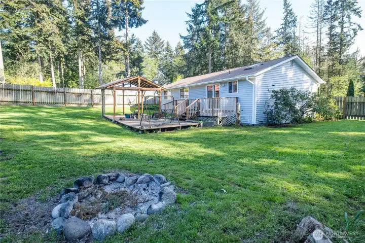 Look at this great yard...and fire pit too!