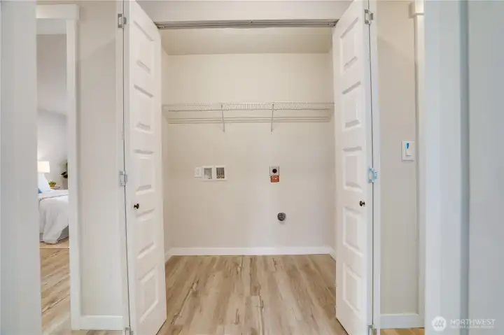 Utility closet is located upstairs where the laundry is made.