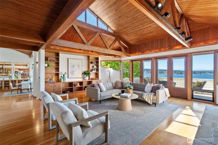 Living room with vaulted trestle beamed ceilings