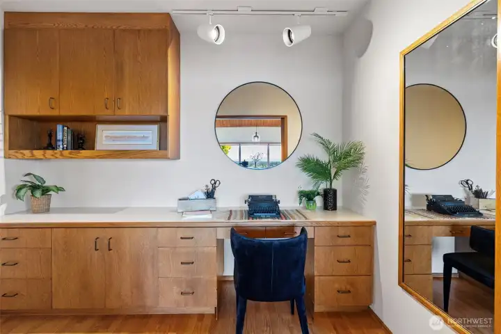 Small office separated from the dining room by pocket doors