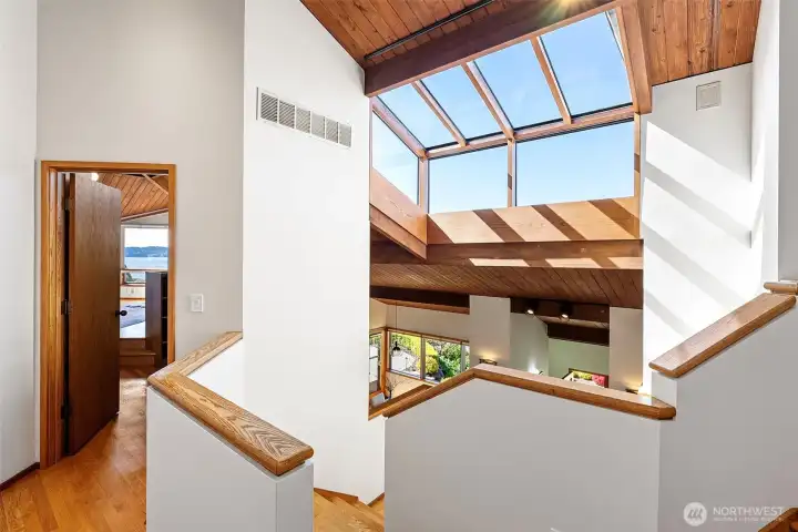 Beautifully designed landing separates the primary suite from the other bedrooms