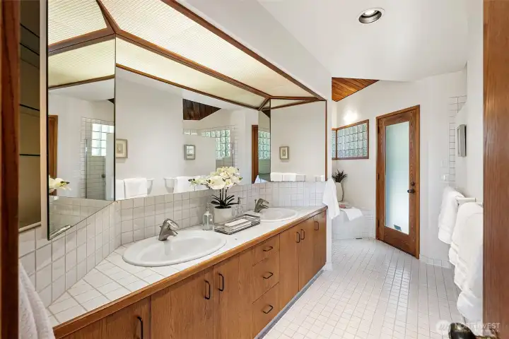 Primary bathroom with door to the back gardens