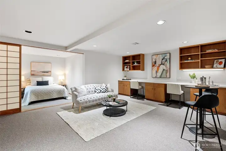 Lower level family room with bedroom area separated by shoji screens