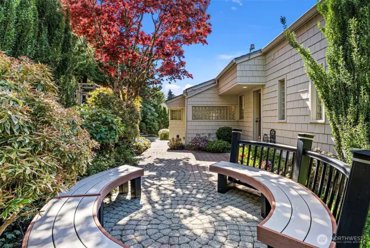 Tranquility garden with custom seating behind the house