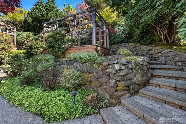 Stairs lead to deer fenced planting beds