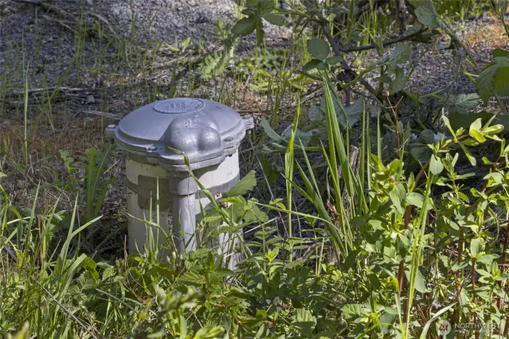 Existing infrastructure includes a 2+ GPM well, electricity onsite, and an approved 4-bedroom gravity septic design for easier future development.