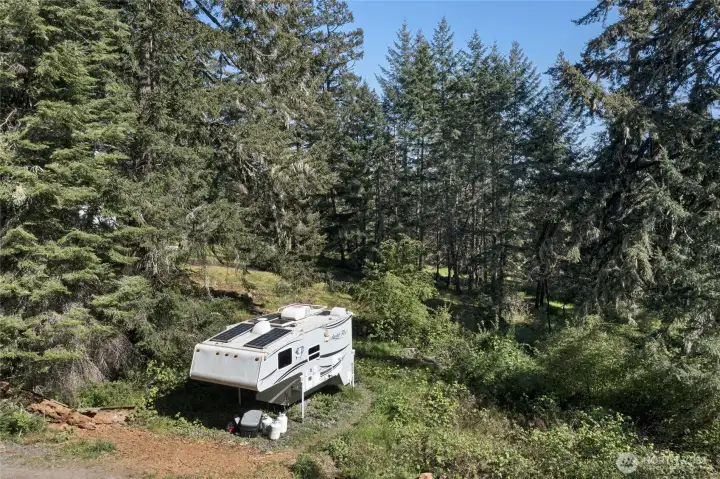 Enjoy the tranquility of island living with a private RV pad tucked into a beautiful forested setting on San Juan Island.