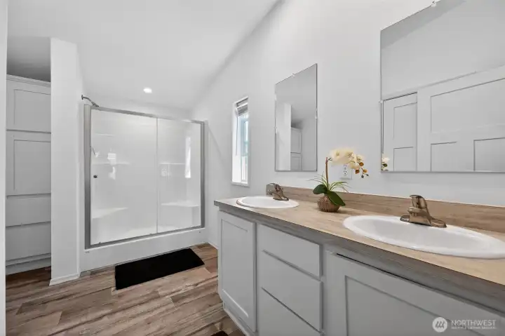 Primary bathroom with dual sink vanity Primary bathroom with dual sink vanity