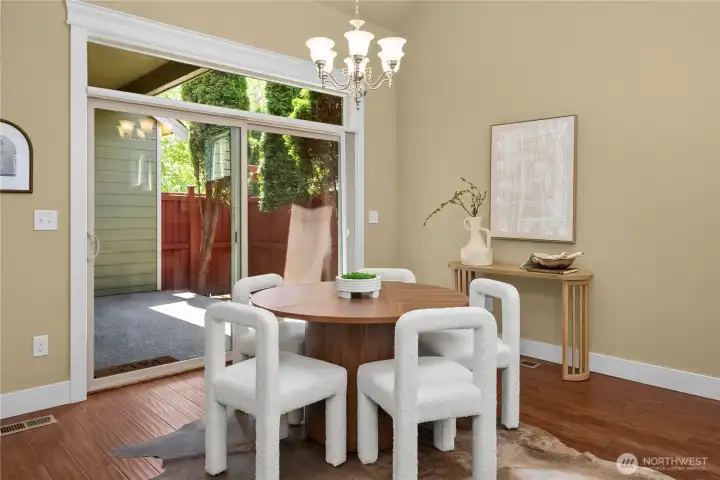 The spacious dining room is perfectly positioned between the living rm & kitchen & also provides easy access to the patio--perfect for entertaining. The spacious dining room is perfectly positioned between the living rm & kitchen & also provides easy access to the patio--perfect for entertaining.