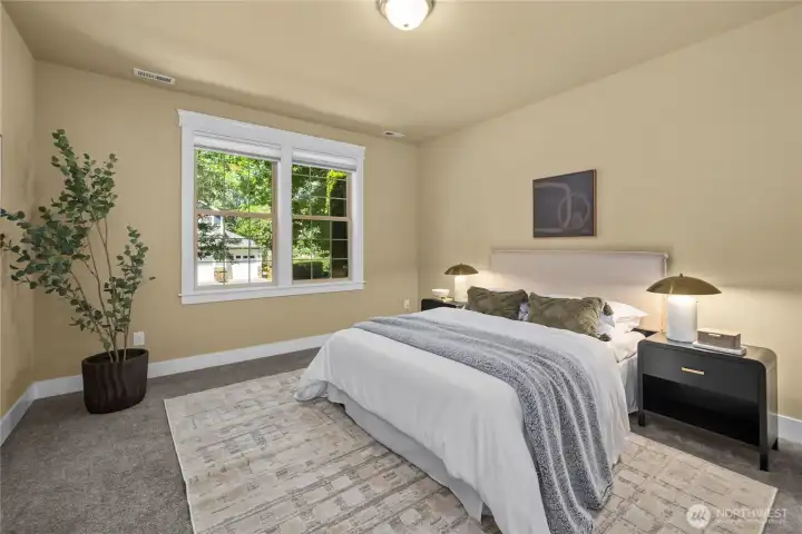 The primary bedroom suite is located on the main floor. The primary bedroom suite is located on the main floor.