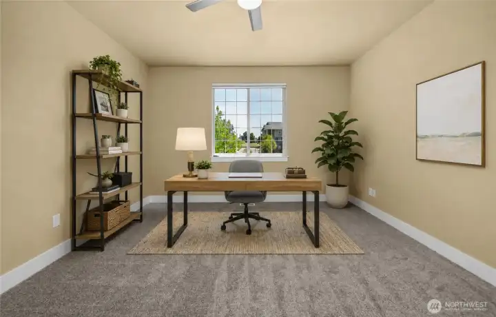Spacious upstairs bedroom 3 offers abundant natural light and a flexible layout, making it ideal as a bedroom, home office, hobby room, or creative space. (photo virtually staged) Spacious upstairs bedroom 3 offers abundant natural light and a flexible layout, making it ideal as a bedroom, home office, hobby room, or creative space. (photo virtually staged)