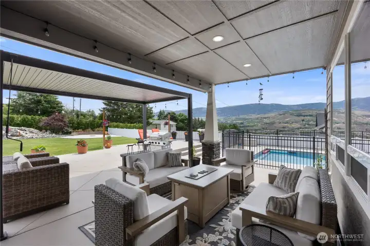 Outdoor covered patio with additional pergola