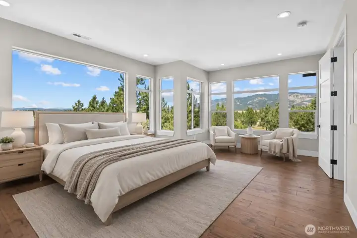 Primary suite offering amazing views. This photo includes virtual staging.