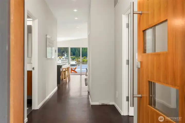 Welcome home! Rich wood floors, smooth walls and a floor plan for living. All framed around water views.