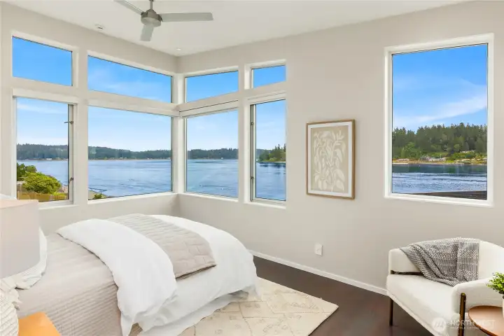 The primary bedroom captures spectacular views.