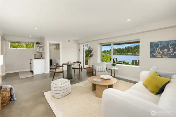 The lower level studio space is an excellent flex space with living area, kitchenette and 3/4 bath.