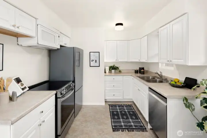 Newer appliances throughout kitchen