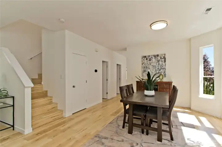 Dining room and stairs. Dining room and stairs.