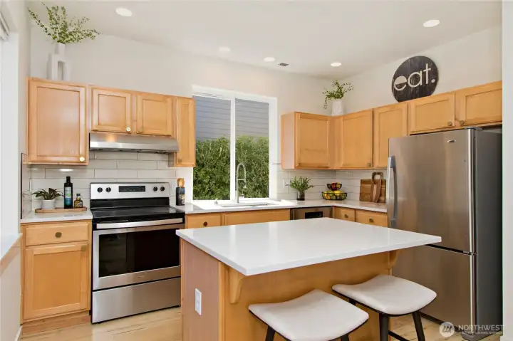 Kitchen and island. Kitchen and island.