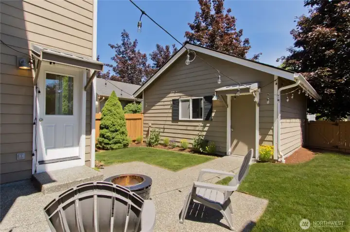 Backyard and garage. Backyard and garage.