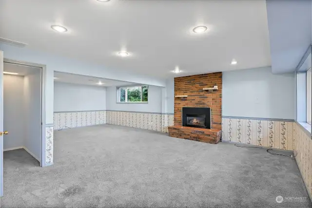 A 3rd gas fireplace in this lower level rec room