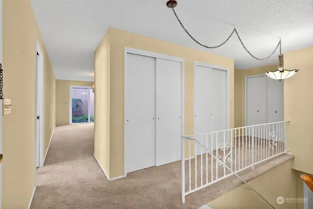 Spacious entrance, double closets, stairs to lower level