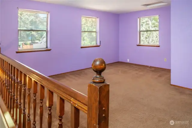 Primary bedroom loft with full bath.