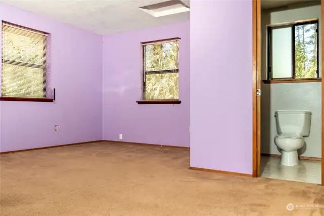 Primary bedroom loft with full bath.