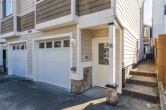 Private entry and attached 1-car garage