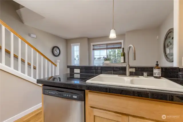 Kitchen sink overlooks the dining area