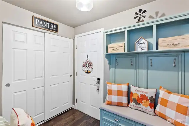 The sweetest mudroom I've seen, with second pantry and entrance to the oversized, attached garage.  There is a separate laundry room just down the hall.