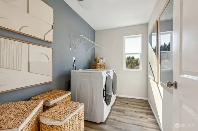 Laundry Room-Disclaimer: Photos are from the Noah model home on Lot 28. Lot 09 layout is mirror image. Finishes, upgrades, features will vary, and these photos are for informational purposes only.