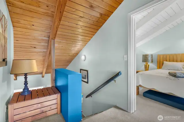 Upstairs landing offers storage and bunkbeds for guests.