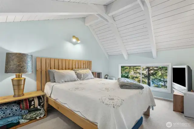 Primary upstairs bedroom offer closet space and additional storage.