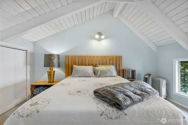 Primary bedroom with closet.