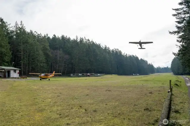 Airfield photo with mail shack on the left side. Mail and packages are delivered by San Juan airlines.