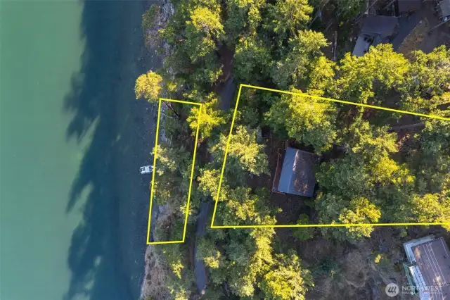 Approximate boundary lines for this large 1/2 acre lot with 111 feet of waterfront. Enjoy your private staircase to access the beach and a boat can be pulled up.