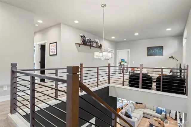 Upstairs you'll find the rest of the bedrooms, a full bathroom, large laundry room and a loft area